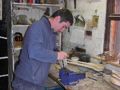 Damien banding a hurley